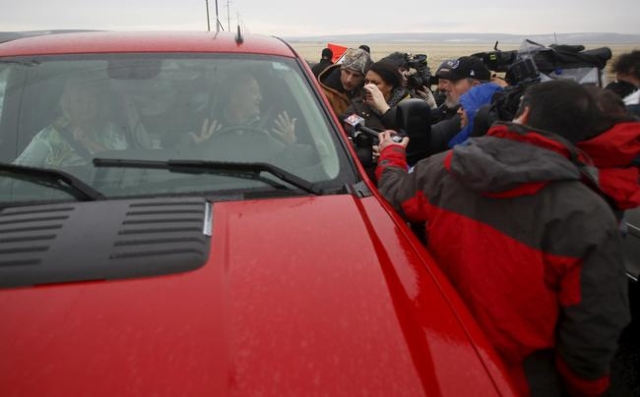 Local ranchers talk to the media after passing through a checkpoint on Highway 205 at the Malheur National Wildlife Refuge outside Burns, Oregon January 28, 2016. U.S. authorities tightened securi ...