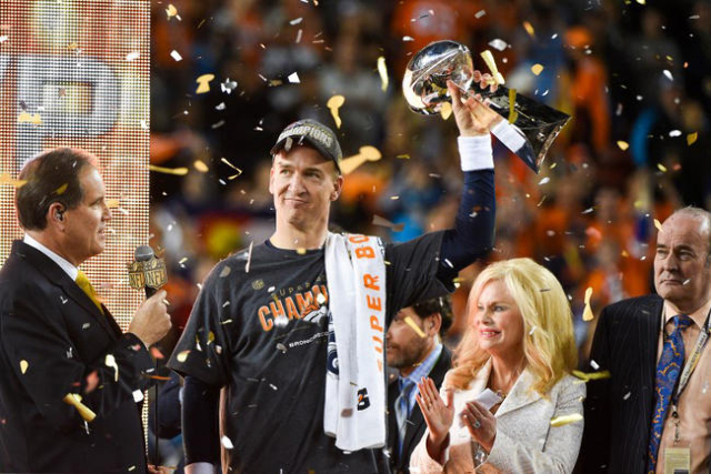Denver Broncos quarterback Peyton Manning holds up the Vince Lombardi Trophy on Feb 7, 2016 after the game against the Carolina Panthers in Super Bowl 50 at Levi‘s Stadium. The Broncos won 2 ...