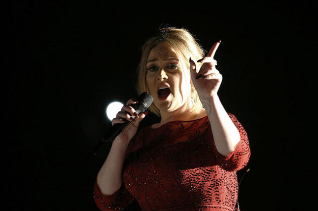 Singer Adele performs "All I Ask" on stage at the 58th Grammy Awards in Los Angeles, California February 15, 2016. REUTERS/Mario Anzuoni