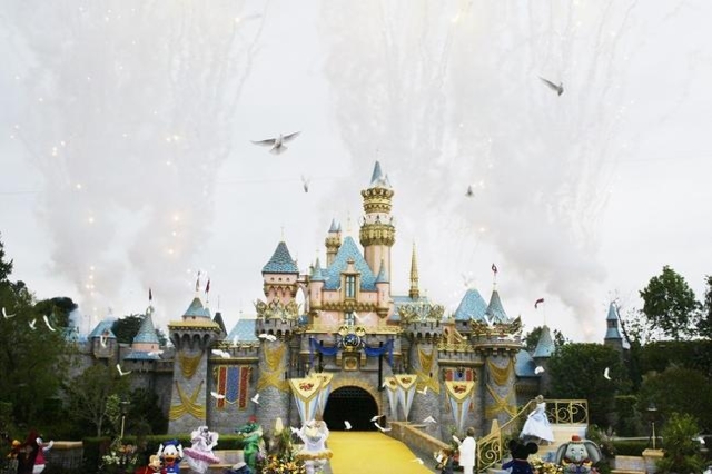 Fireworks fill the sky and doves are released during the finale at Disneyland‘s 50th anniversary celebration ceremony at the Disneyland theme park as "The Happiest Homecoming on Earth&q ...