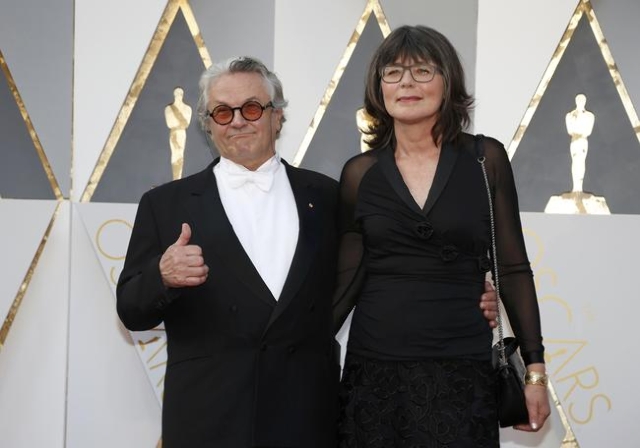 Producer and director George Miller, nominated for Best Director and Best Picture for "Mad Max: Fury Road," arrives with his wife Margaret Sixel, who is nominated for Best Film Editing f ...
