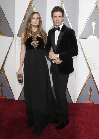 Eddie Redmayne, nominated for Best Actor for his role in "The Danish Girl", arrives with wife Hannah Bagshawe at the 88th Academy Awards in Hollywood, California February 28, 2016.  REUT ...