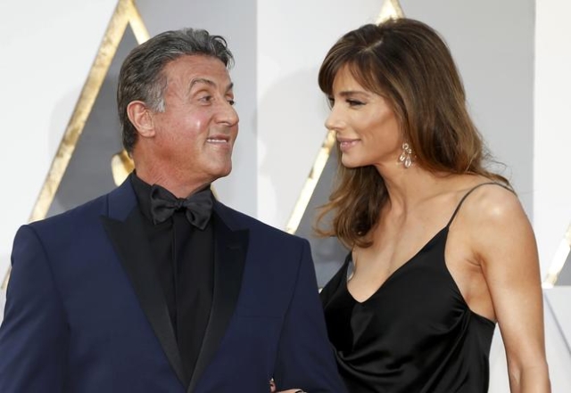 Sylvester Stallone, nominated for Best Supporting Actor for his role in "Creed," and wife Jennifer Flavin arrive at the 88th Academy Awards in Hollywood, California February 28, 2016.  R ...