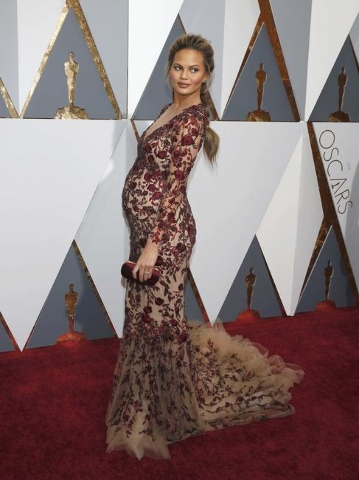 Model Chrissy Teigen arrives at the 88th Academy Awards in Hollywood, California February 28, 2016.  REUTERS/Adrees Latif