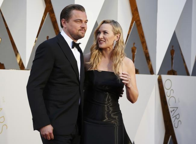 Kate Winslet, nominated for Best Supporting Actress for her role in "Steve Jobs," and Leonardo DiCaprio, nominated for Best Actor for his role in "The Revenant," arrive at the  ...