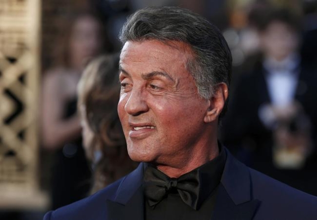 Sylvester Stallone, nominated for Best Supporting Actor for his role in "Creed", gestures as he arrives at the 88th Academy Awards in Hollywood, California February 28, 2016.  REUTERS/Lu ...