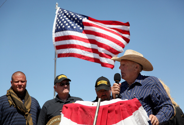 Cliven Bundy addresses a crowd of around 150 during a press conference at the protest camp near his ranch in Bunkerville on Monday, April 14, 2014. (Las Vegas Review-Journal)