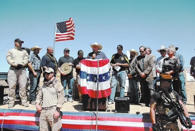 Cliven Bundy addresses a crowd of around 150 during a press conference at the protest camp near his ranch in Bunkerville on Monday, April 14, 2014. (Las Vegas Review-Journal)