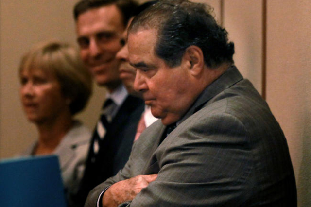 Supreme Court Justice Antonin Scalia stands in the Boyd Law School‘s Thomas and Mack Moot Court Facility before speaking Wednesday, Sept. 6, 2012. Jeff Scheid/Las Vegas Review-Journal Follow ...