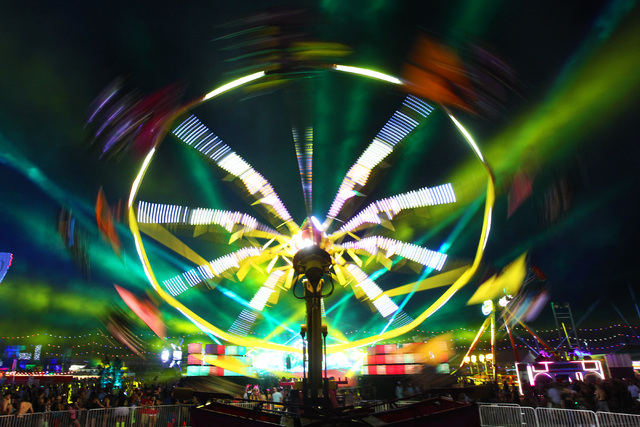 Lasers light up the sky as an amusement ride spins during the first night of the Electric Daisy Carnival Saturday, June 20, 2015 at the Las Vegas Motor Speedway. (Sam Morris/Las Vegas Review-Journ ...