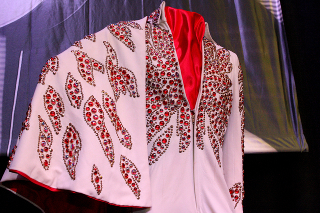 The Red Flower Jumpsuit worn by Elvis during his January/February 1973 Las Vegas engagement was one of many on display to promote a permanent exhibition at the Westgate hotel-casino featuring hund ...