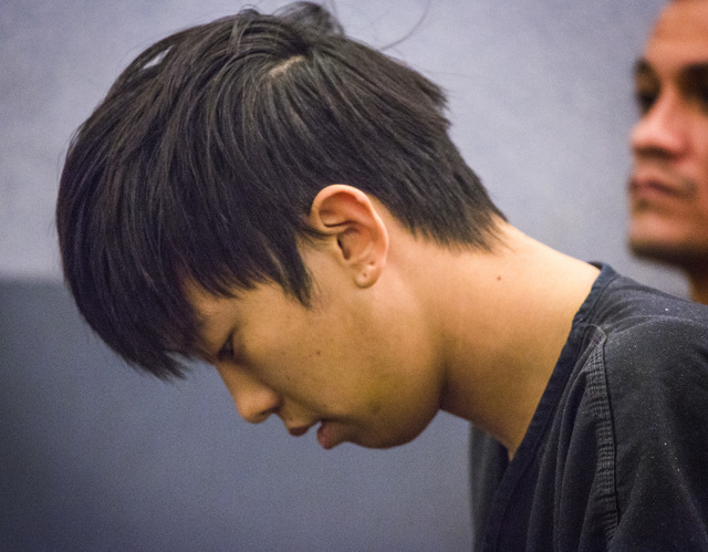 Seong Mo Lee, charged with DUI in fatal crash that killed two teenage sisters, makes his first appearance in Las Vegas Justice Court on Monday, March 9, 2015. Lee, who was on bail for a previous ...