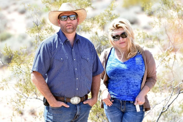 Cliven Bundy‘s son, Ammon Bundy, left and Nevada Assemblywoman Michele Fiore look on during a news conference at an event near the Bundy Ranch in Bunkerville on Saturday, April 11, 2015.  Cl ...