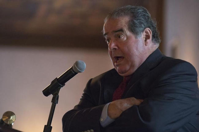 U.S. Supreme Court Justice Antonin Scalia speaks at an event sponsored by the Federalist Society at the New York Athletic Club in New York October 13, 2014. REUTERS/Darren Ornitz