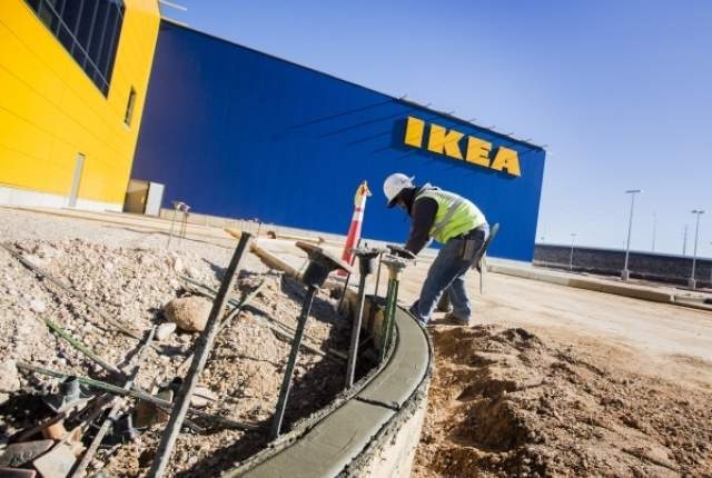 A worker is seen in front of the Ikea store at 215 Beltway at Durango Drive, on Thursday, Dec. 17,2015. The 351,000 square foot home furnishing store is scheduled to open next summer. Jeff Scheid/ ...