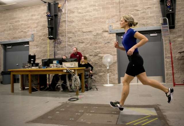 Sophia Bradley runs as a 10-camera motion capture system tracks her movements inside the Sports Injury Research Center in the Paul McDermott Physical Education Complex on the UNLV campus Jan. 22.  ...