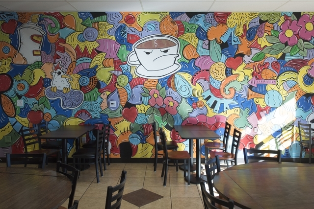 A mural covers one wall of the back dining area at Grouchy John's Coffee, 8520 S. Maryland Parkway. Jason Ogulnik/Las Vegas Review-Journal