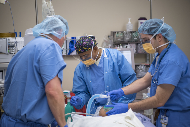 Samson Otuwa, physician anesthesiologist, center, preps a patient for surgery at University Medical Center in Las Vegas on Friday, Feb. 12, 2016. Joshua Dahl/Las Vegas Review-Journal
