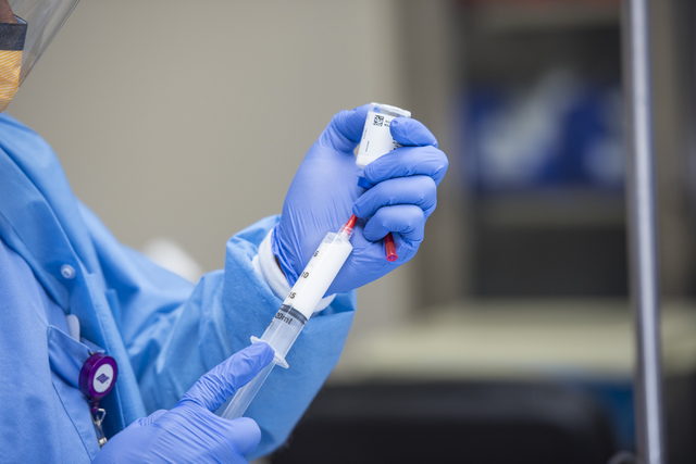 Samson Otuwa, physician anesthesiologist, prepares a medication during a surgery at University Medical Center in Las Vegas on Friday, Feb. 12, 2016. Joshua Dahl/Las Vegas Review-Journal