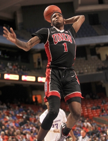 UNLV player Derrick Jones Jr. (1) dunks against the Boise State defense during the game at Taco Bell Arena in Boise, Idaho, on Tuesday Feb. 23, 2016. (Kyle Green/Las Vegas Review-Journal)