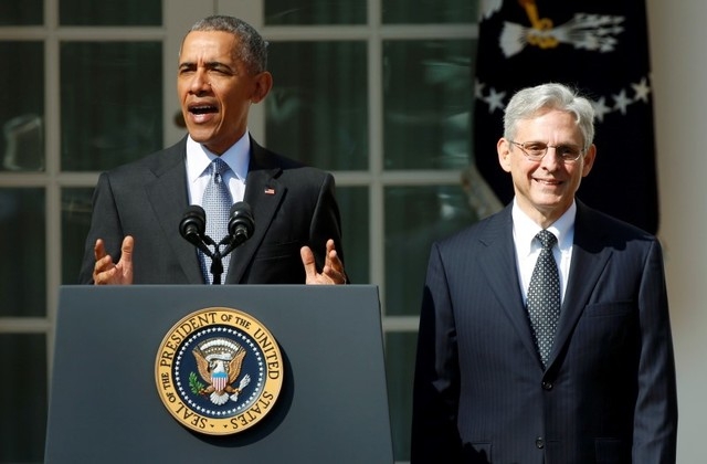 President Barack Obama, left, announces Judge Merrick Garland as his nominee to the U.S. Supreme Court, in the White House Rose Garden in Washington, March 16, 2016. (Kevin Lamarque/Reuters)