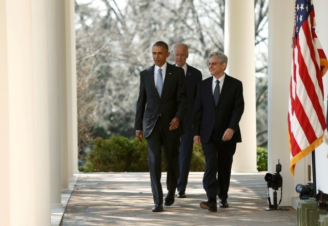 President Barack Obama, left, arrives with Judge Merrick Garland, right, and Vice President Joe Biden prior to announcing Garland as his nominee to the U.S. Supreme Court, at the White House in Wa ...