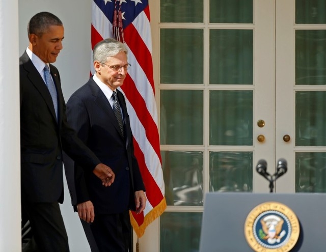President Barack Obama, left, walks with Appeals Court Judge Merrick Garland toward a microphone to announce Garland as his nominee to the U.S. Supreme Court in the Rose Garden of the White House  ...