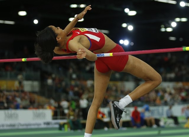Vashti Cunningham of the U.S. jumps on her way to the gold medal in the women's high jump during the IAAF World Indoor Athletics Championships in Portland, Oregon March 20, 2016. REUTERS/Mike Blake