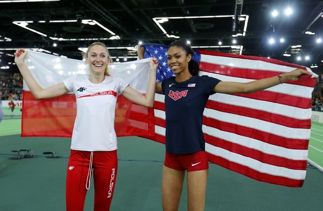 Bronze medal winner Kamila Licwinko of Poland (L) and gold medal winner Vashti Cunningham of the U.S. celebrate after the women's high jump during the IAAF World Indoor Athletics Championships in  ...