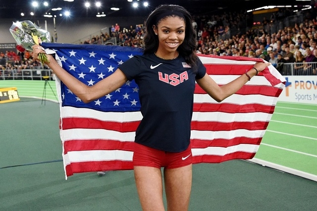 Mar 20, 2016; Portland, OR, USA; Vashti Cunningham (USA) poses with United States flag after winning the womens high jump during the 2016 IAAF World Championships in Athletics at the Oregon Conven ...