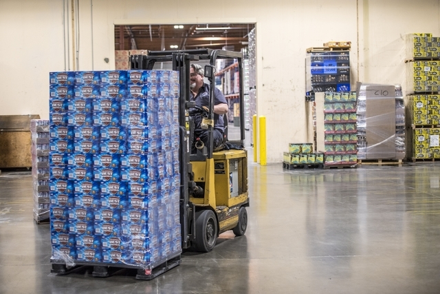 Mike Funke moves cases of beer at Bonanza Beverage Company in Las Vegas on Wednesday, Feb. 17, 2016. Joshua Dahl/Las Vegas Review-Journal