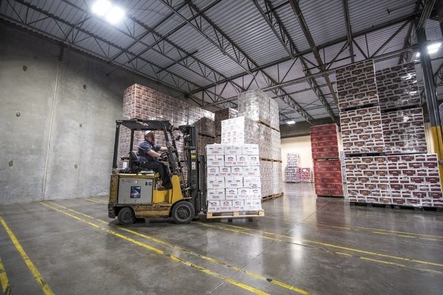 Mike Funke moves cases of beer at Bonanza Beverage Company in Las Vegas on Wednesday, Feb. 17, 2016. Joshua Dahl/Las Vegas Review-Journal