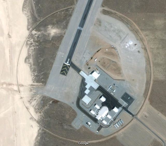 A Google Maps image shows hangar facilities off the Area 6 runway at the Nevada National Security Site.