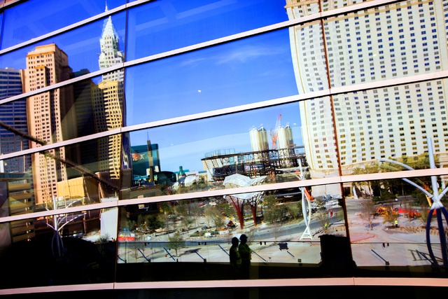 A reflection of "The Park" off the T-Mobile Arena behind New York-New York is seen Monday, Feb. 29, 2016. The joint venture partners AEG and MGM Resorts is scheduled to open the arena next month. ...