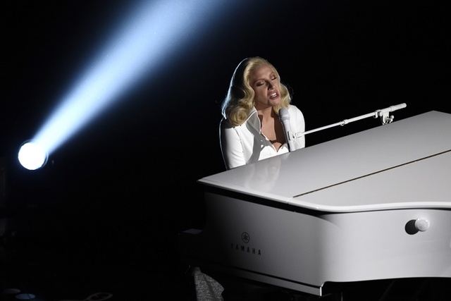 In this Feb. 2016 file photo, Lady Gaga performs at the Oscars at the Dolby Theatre in Los Angeles. (Chris Pizzello/Invision/AP)