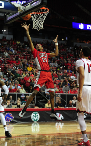 UNLV guard Patrick McCaw (22) goes up for a shot against Fresno State in the second half of their Mountain West Conference semifinal basketball game at the Thomas & Mack Center in Las Vegas Th ...