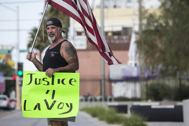Rick Pollard protests to demand justice for the death of Oregon Occupier LaVoy Finicum and to show support for Bunkerville rancher Cliven Bundy outside of the Lloyd George Federal Courthouse in La ...