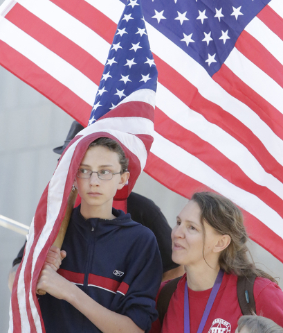 Kevin Baxter, left, and his mother, Christine Shelby, of Las Vegas protest outside Lloyd George Federal Building on Thursday, March 10, 2016, in Las Vegas. Cliven Bundy appears in court this after ...