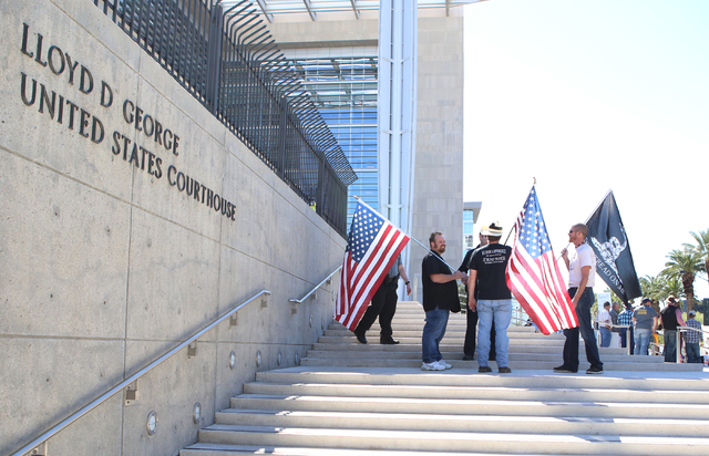 People protest outside Lloyd George Federal Building on Thursday, March 10, 2016, in Las Vegas. Cliven Bundy appears in court this afternoon. Bizuayehu Tesfaye/Las Vegas Review-Journal Follow @biz ...