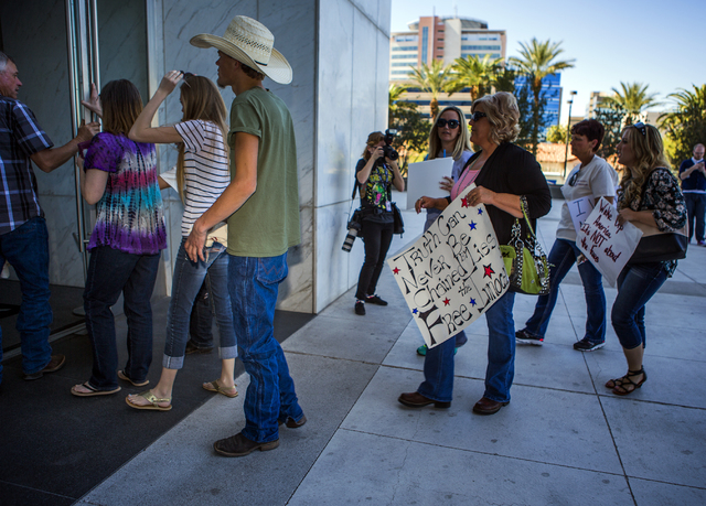 Family and supporters or rancher Cliven Bundy enter Lloyd George United States Courthouse on Thursday, March 10, 2016.Jeff Scheid/Las Vegas Review-Journal Follow @jlscheid