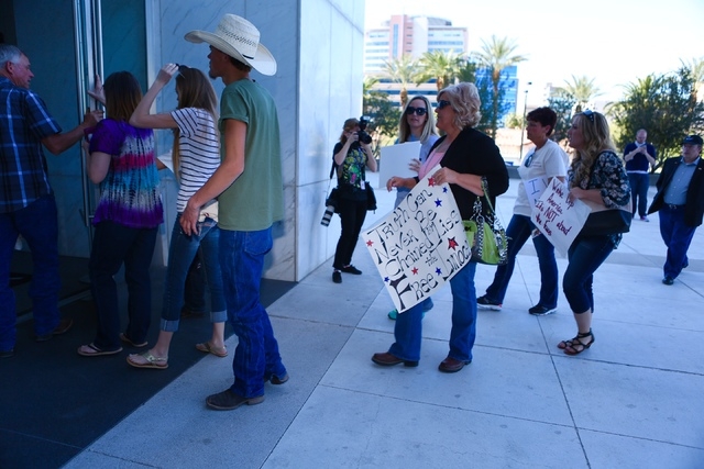 Family and supporters of Cliven Bundy enter the Lloyd George Federal Building on Thursday, March 10, 2016, in Las Vegas. (Jeff Scheid/Las Vegas Review-Journal)