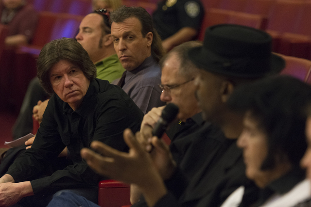 Las Vegas City Attorney Brad Jerbic, left, listens as busker Scarlet Ray Watt, second from right, speaks during a meeting at Las Vegas City Hall Council Chambers Thursday, March 10, 2016. Jason Og ...