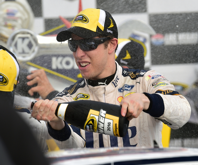 NASCAR Sprint Cup Series driver Brad Keselowski (2) sprays champagne in victory lane after winning the Kobalt 400 at Las Vegas Motor Speedway in Las Vegas Sunday, March. 6, 2016. Josh Holmberg/Las ...