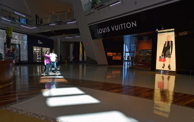 Exterior of Louis Vuitton storefront at the Crystals Shops in Las Vegas City  Center. Stock Photo