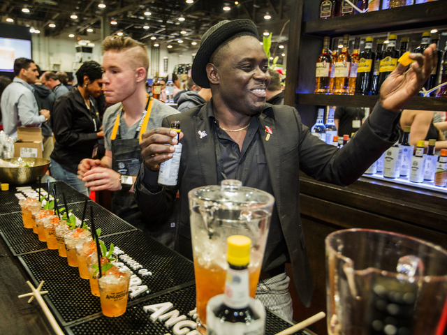 Mixologist Raymond Edwards serves Queen Park Swizzle in the Angostura booth at the Nightclub & Bar Convention & Trade Show in the Las Vegas Convention Center on Tuesday,  March 8, 2016. Je ...