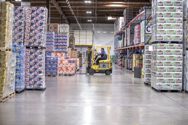 An employee moves cases of beer at Bonanza Beverage Company in Las Vegas on Wednesday, Feb. 17, 2016. Joshua Dahl/Las Vegas Review-Journal