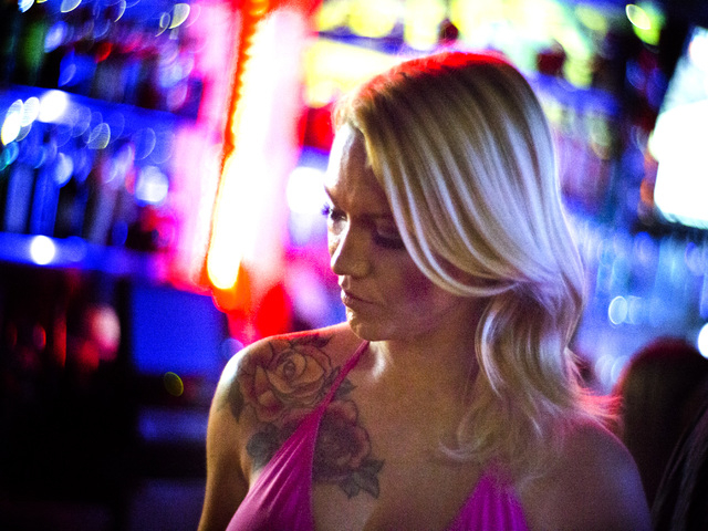 Daisy, her stage name, stands a one of the bars at  Sapphire Gentleman's Club, 3025 Sammy Davis Jr. Drive on Friday, Feb. 26, 2016. Jeff Scheid/Las Vegas Review-Journal Follow @jlscheid