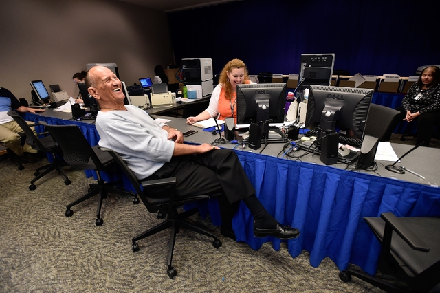Louis Toomin smiles as he files with election officer Heather Kellan as a candidate to run for the 15th district seat in the Nevada State Assembly at the Clark County Government Center Friday, Mar ...