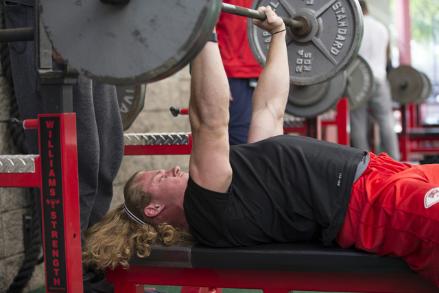 UNLV's Kimble Jensen warms up for the bench press challenge during Pro Day at UNLV's Lied Athletic Complex on Thursday, March 17, 2016, in Las Vegas. Erik Verduzco/Las Vegas Review-Journal Follow  ...