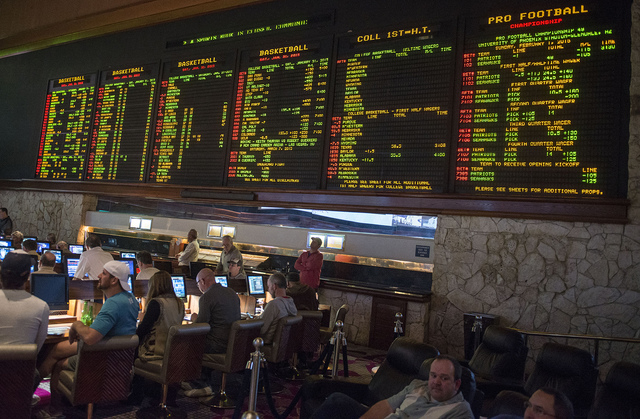 The odds board at the Mirage in Las Vegas on Saturday, Jan. 31, 2015. Gamblers wagered over $100 million on the Super Bowl in 2014. (Jacob Kepler/Las Vegas Review-Journal)